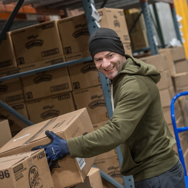 warehouse worker moving boxes