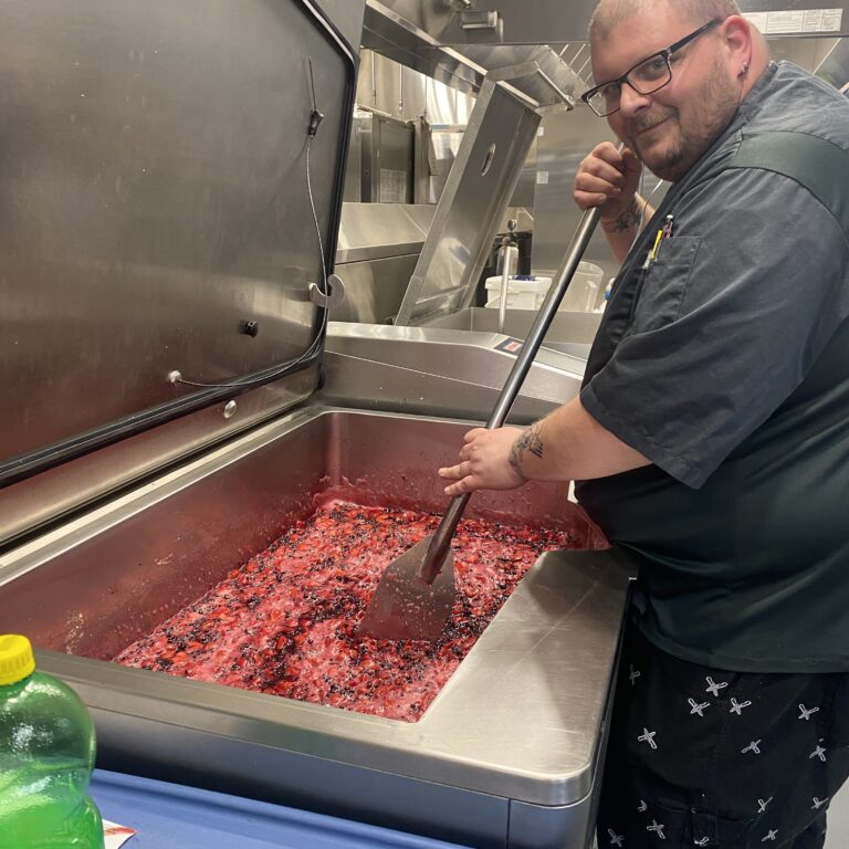 Chef preparing compote in vario cooking center